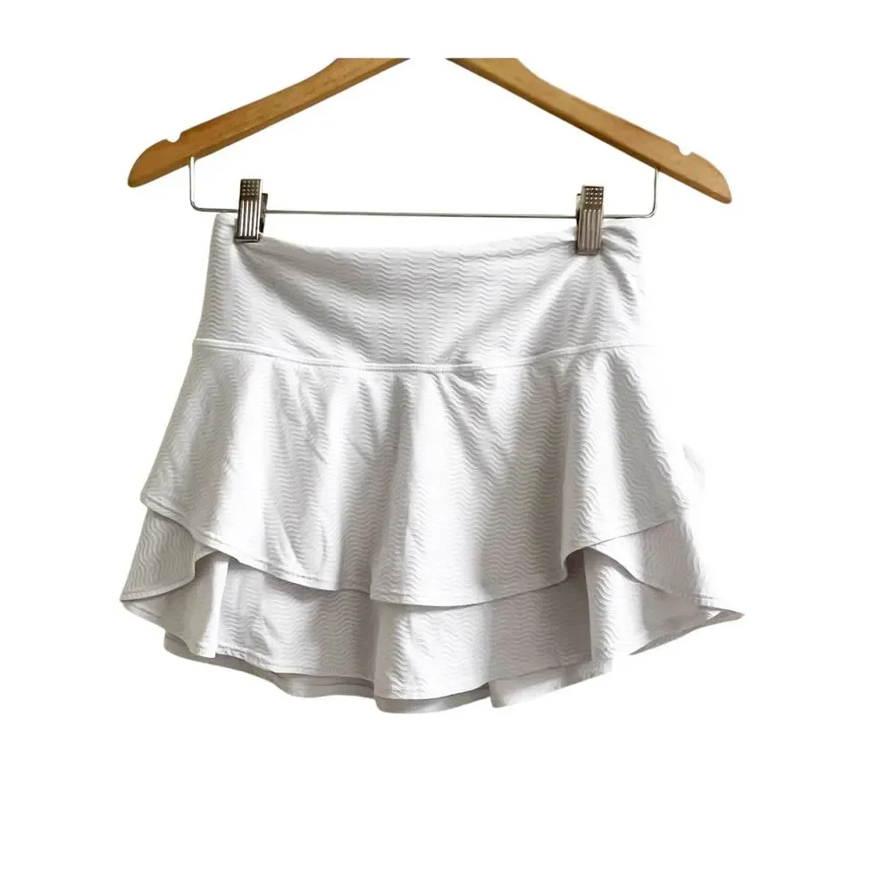 Athleta Serve Skort Girls Size XL White Squiggle Textured Ruffled Sportswear